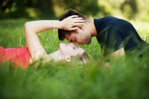 romantic man and woman in field interpersonal closeness