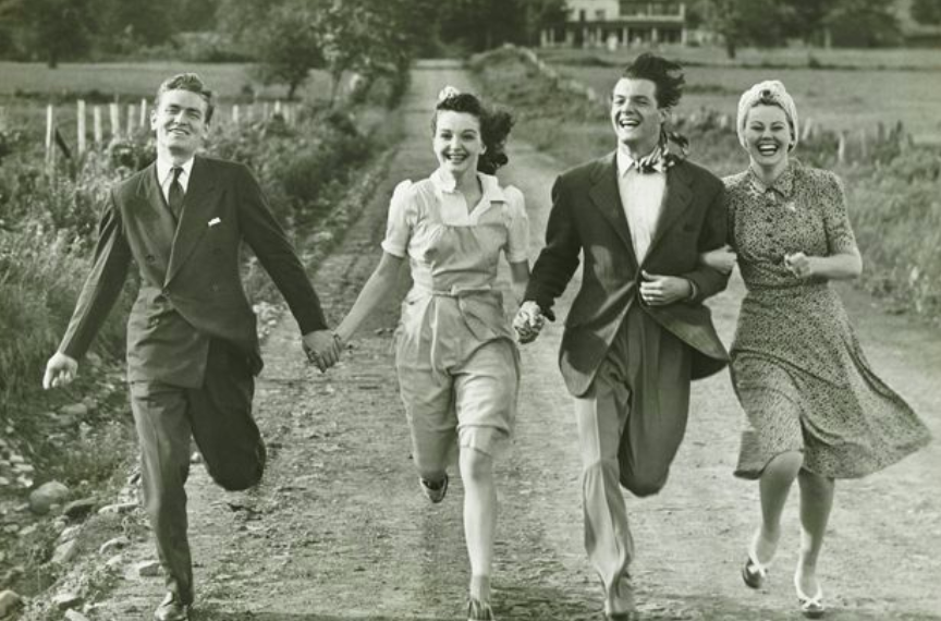 vintage sensuality, two couple linking arms and hands and running