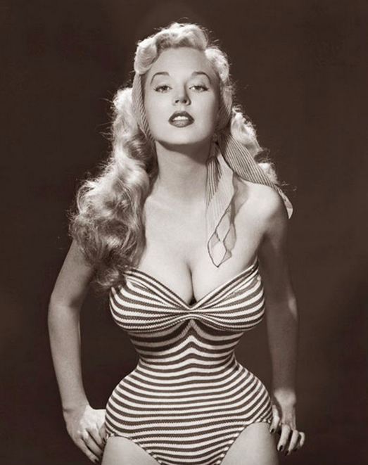 Busty 1950s sex symbol, Betty Brosmer, flaunts extreme cleavage